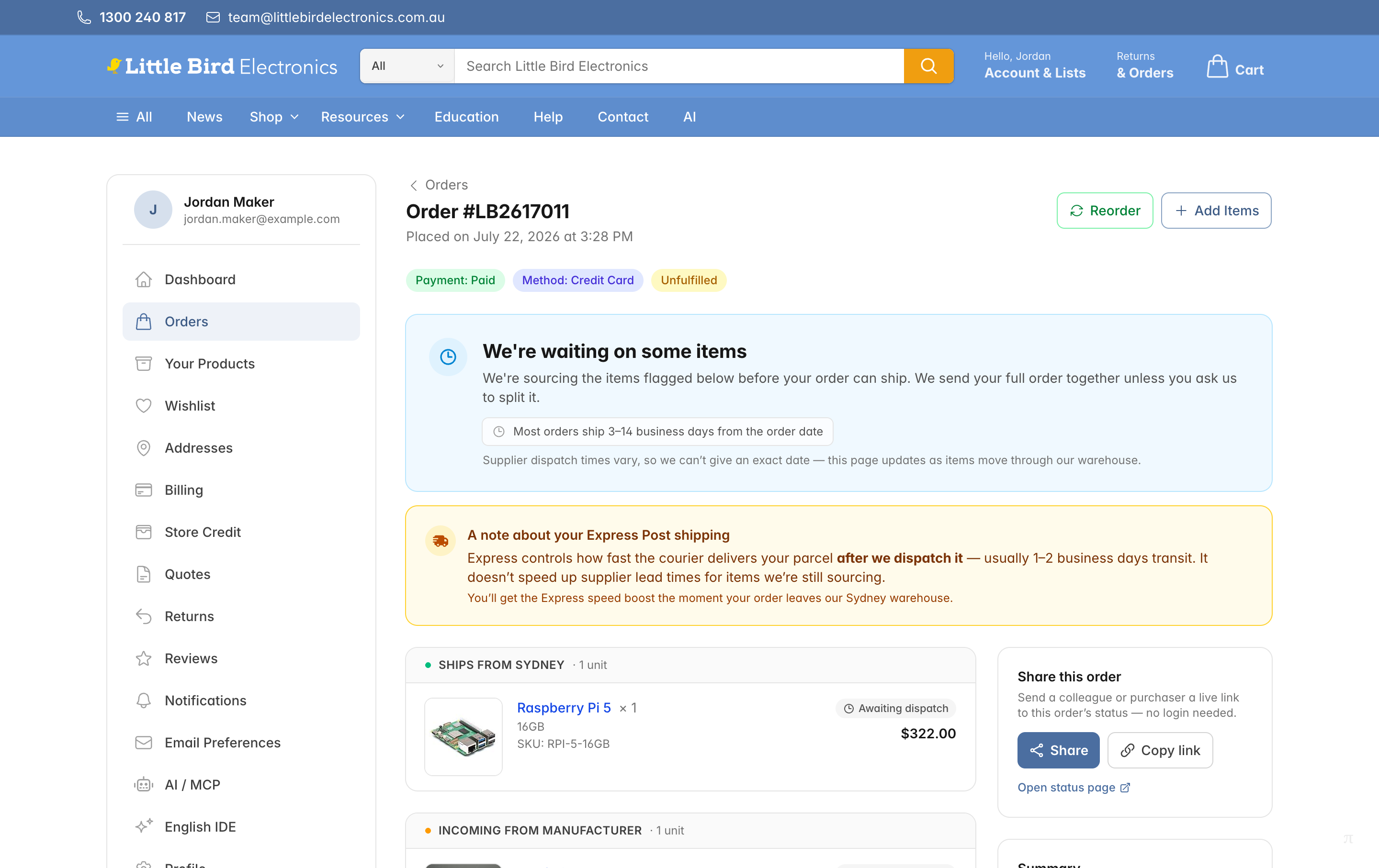 An order page showing the Payment: Paid badge and the Add Items button at the top right