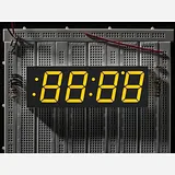Yellow 7-segment clock display - 1.2 digit height - Image 1