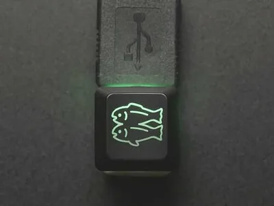 Etched Glow-Through Keycap with Glitch Logo