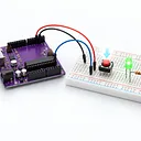 Press a button to light an LED